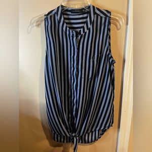 The Limited Size Medium super cute Dark and lighter blue in color sleeveless top